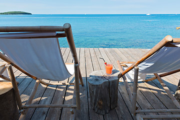 Image showing Wooden floor with chaise-longues in Istria