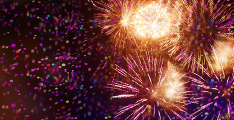 Image showing bright sparkling multicolor fireworks and confetti