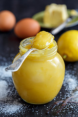 Image showing Jar with lemon custard, lemon, egg.