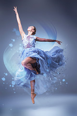 Image showing The beautiful ballerina dancing in blue long dress 