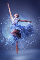 Image showing The beautiful ballerina dancing in blue long dress 