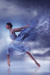 Image showing The beautiful ballerina dancing in blue long dress 