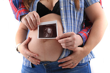 Image showing pregnancy woman with ultrasound photo