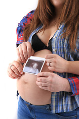 Image showing pregnancy woman with ultrasound photo