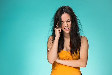 Image showing Frustrated young woman having a bad hair