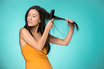 Image showing Frustrated young woman having a bad hair