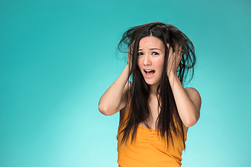 Image showing Frustrated young woman having a bad hair