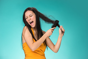 Image showing Frustrated young woman having a bad hair