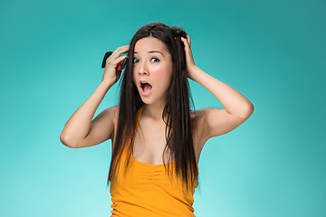 Image showing Frustrated young woman having a bad hair