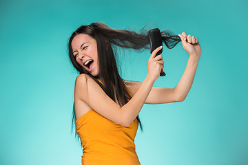 Image showing Frustrated young woman having a bad hair