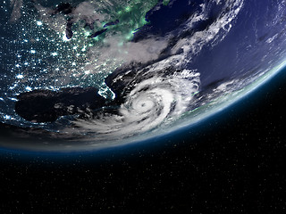 Image showing Hurricane and city light above America