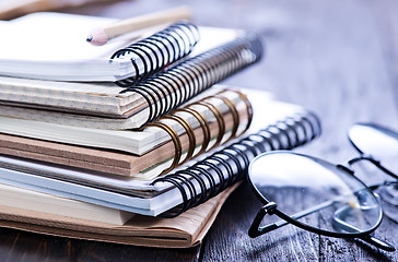 Image showing Stack of spiral notebooks