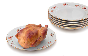 Image showing Delicious fried chicken on white ceramic dish