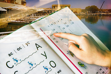 Image showing First-graders learning to read by syllables. Double exposure