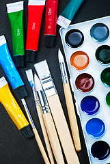 Image showing paint and brushes