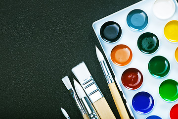 Image showing paint and brushes