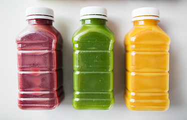 Image showing bottles with different fruit or vegetable juices