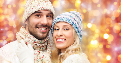 Image showing close up of couple in winter clothes hugging