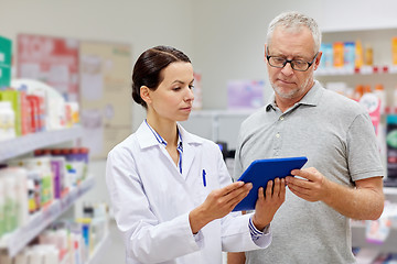 Image showing pharmacist with tablet pc and senior man