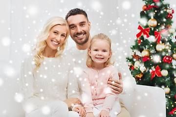 Image showing happy family at home with christmas tree