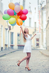 Image showing woman with colorful balloons