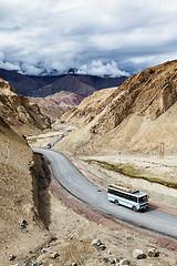 Image showing Indian passenger bus on highway in Himalayas. Ladakh, India