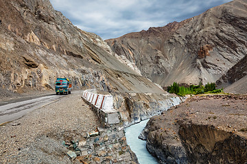 Image showing Indian lorry trucks on highway in Himalayas. Ladakh, India