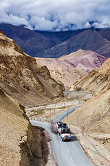 Image showing Indian lorry trucks on highway in Himalayas. Ladakh, India