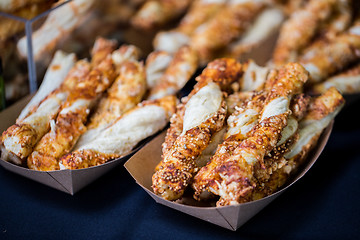 Image showing close up of pastry in serving paper boxes