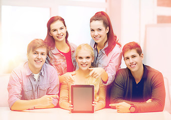 Image showing smiling students with blank tablet pc screen