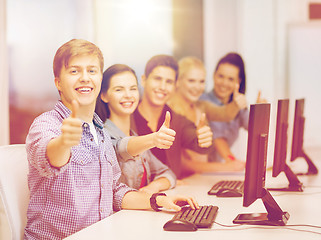 Image showing students with computer monitor showing thumbs up