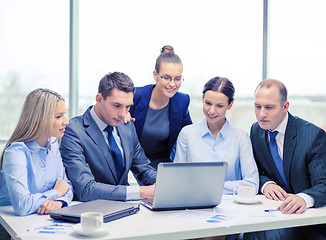 Image showing business team with laptop having discussion