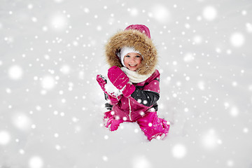 Image showing f happy little child or girl with snow in winter