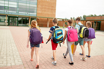 Image showing group of happy elementary school students walking