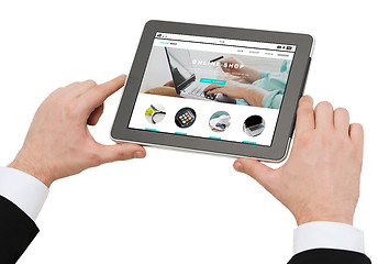 Image showing close up of hands holding tablet pc with