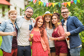 Image showing happy friends with drinks at summer garden party