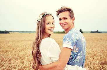 Image showing happy smiling young hippie couple outdoors