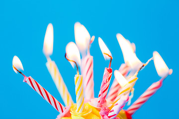 Image showing birthday cupcake with many burning candles