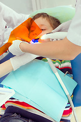 Image showing Boy and dentist during a dental procedure