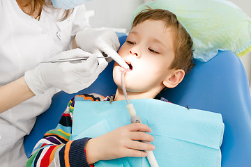 Image showing Boy and dentist during a dental procedure