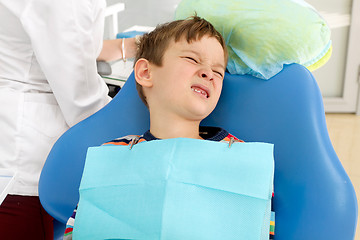 Image showing Boy and dentist during a dental procedure