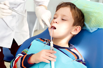 Image showing Boy and dentist during a dental procedure