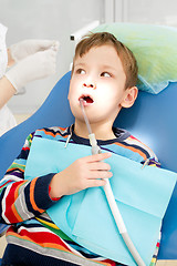 Image showing Boy and dentist during a dental procedure