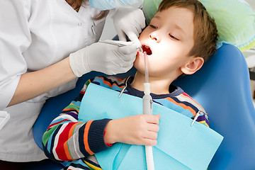 Image showing Boy and dentist during a dental procedure