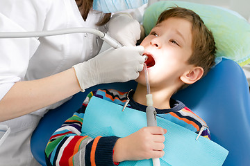Image showing Boy and dentist during a dental procedure