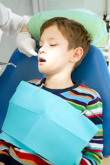 Image showing Boy and dentist during a dental procedure