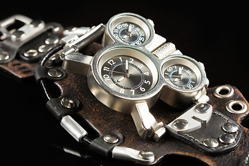 Image showing unusual watches. several alternatives dials