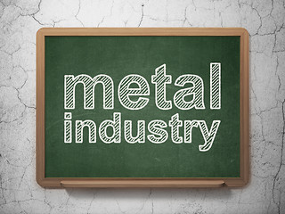 Image showing Manufacuring concept: Metal Industry on chalkboard background