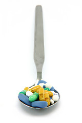 Image showing spoon full of pills