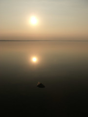 Image showing Setting sun across Lake Unden
